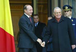 Romanian President Traian Basescu and outgoing President Ion Iliescu