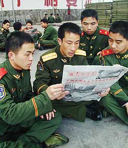 Paramilitary police read about China's anti-secession law on Taiwan