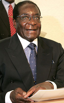 President Robert G. Mugabe of Zimbabwe denounced President Bush and Prime Minister Tony Blair of Britain